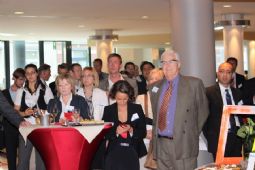 Delegates listening to the speeches during the cocktail reception 