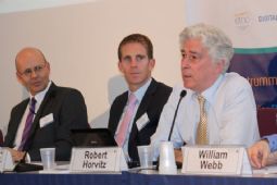 Bob Horvitz (OpenSpectrum), watched by Lasse Wieweg (Ericsson) and Kris Shields (Computech) 